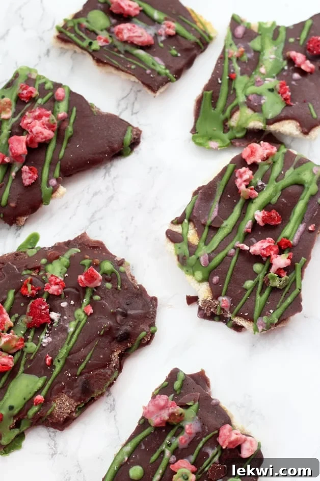 Four pieces of paleo Christmas crack laying out on a counter, ready to be enjoyed.