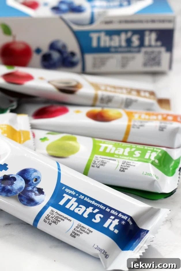 Various flavors of That's Its bars in a pile.