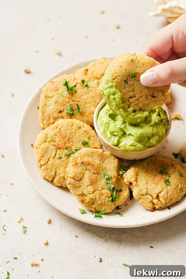 Guacamole and cauliflower veggie nuggets on a plate, highlighting a healthy and delicious snack option.