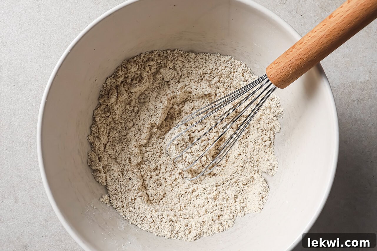 Dry ingredients: tigernut flour, tapioca starch, baking soda, and gelatin combined in a mixing bowl.