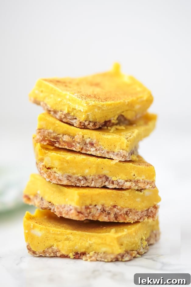 A stack of five turmeric bars stacked on top of each other, showcasing the golden color and tempting layers.