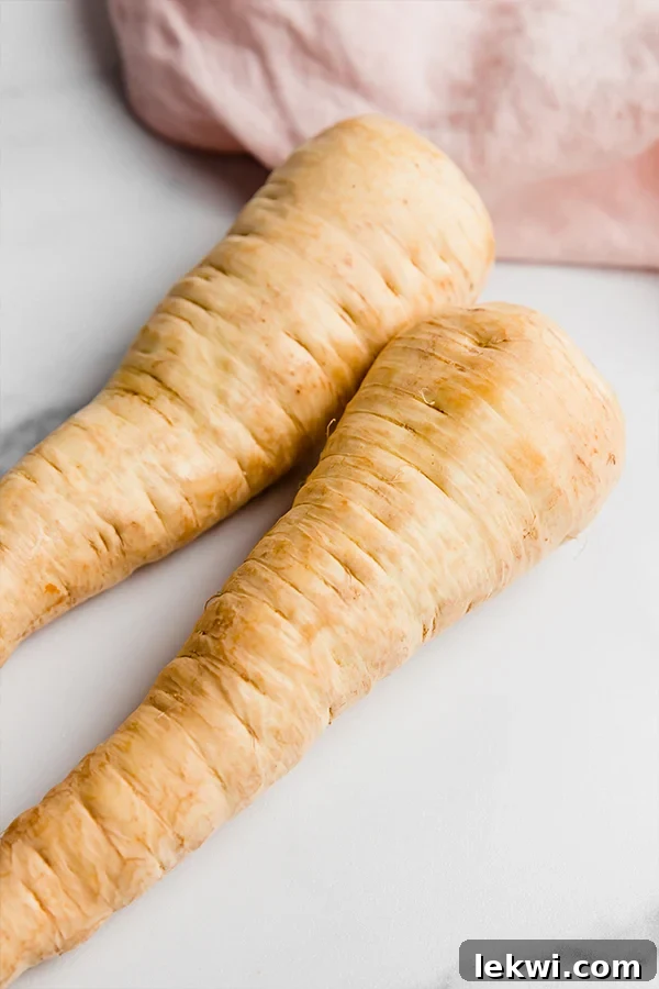 Large, raw parsnips, ideal for slicing into fries.
