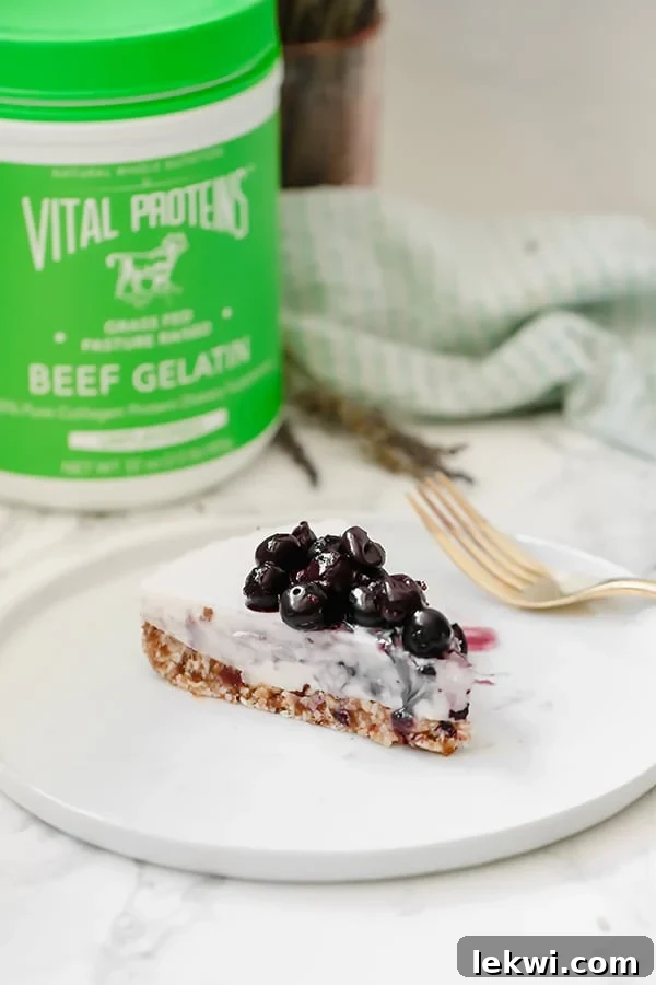 An inviting close-up of a blueberry lavender cheesecake slice, showing the smooth texture and fresh blueberries, ready to be enjoyed.
