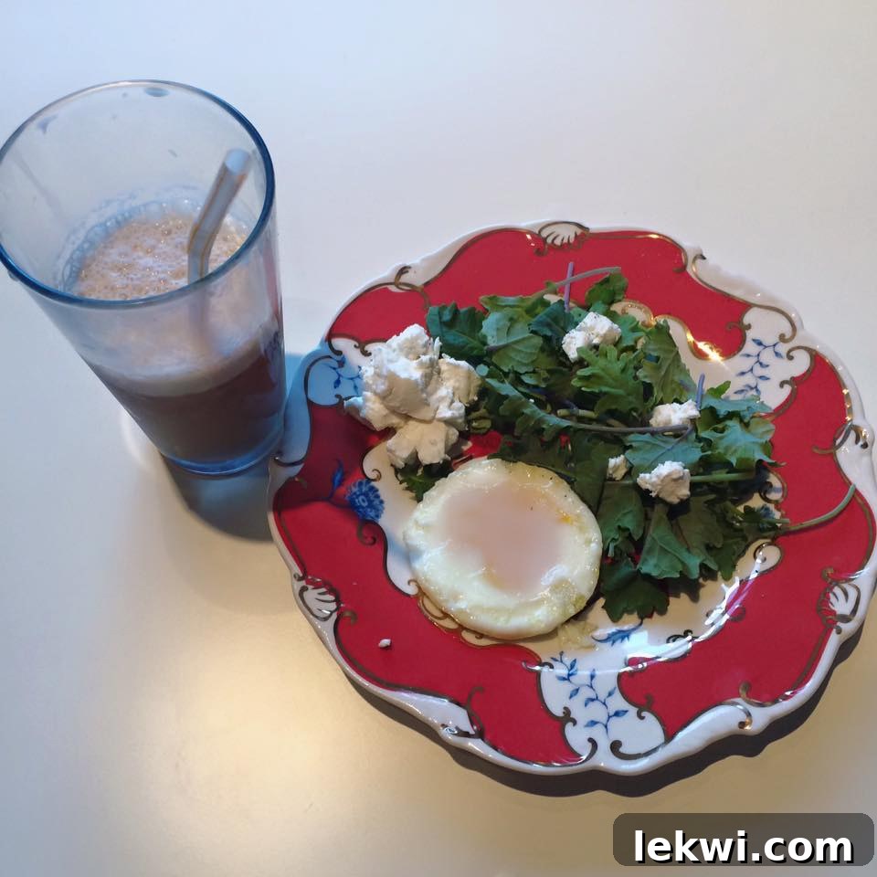 A vibrant breakfast spread featuring fresh local produce, artisanal dairy, and cold brew coffee, aligning with AIP reintroductions.
