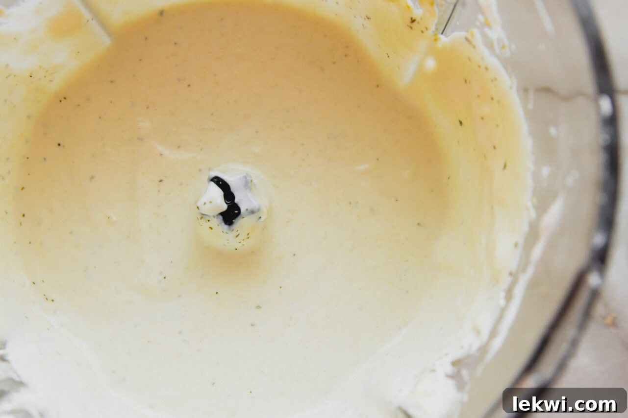 Coconut cream, coconut yogurt, and steamed cauliflower blended into a smooth, creamy puree in a food processor.