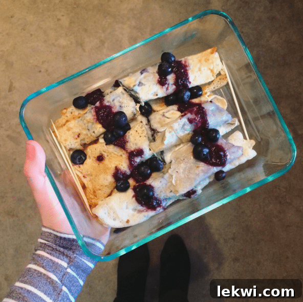 Autumn Harvest: Johnson's Organic Garden Tour and Potluck 4 Paleo crepes prepared with local, pastured eggs and a blueberry sauce, ready for the potluck.