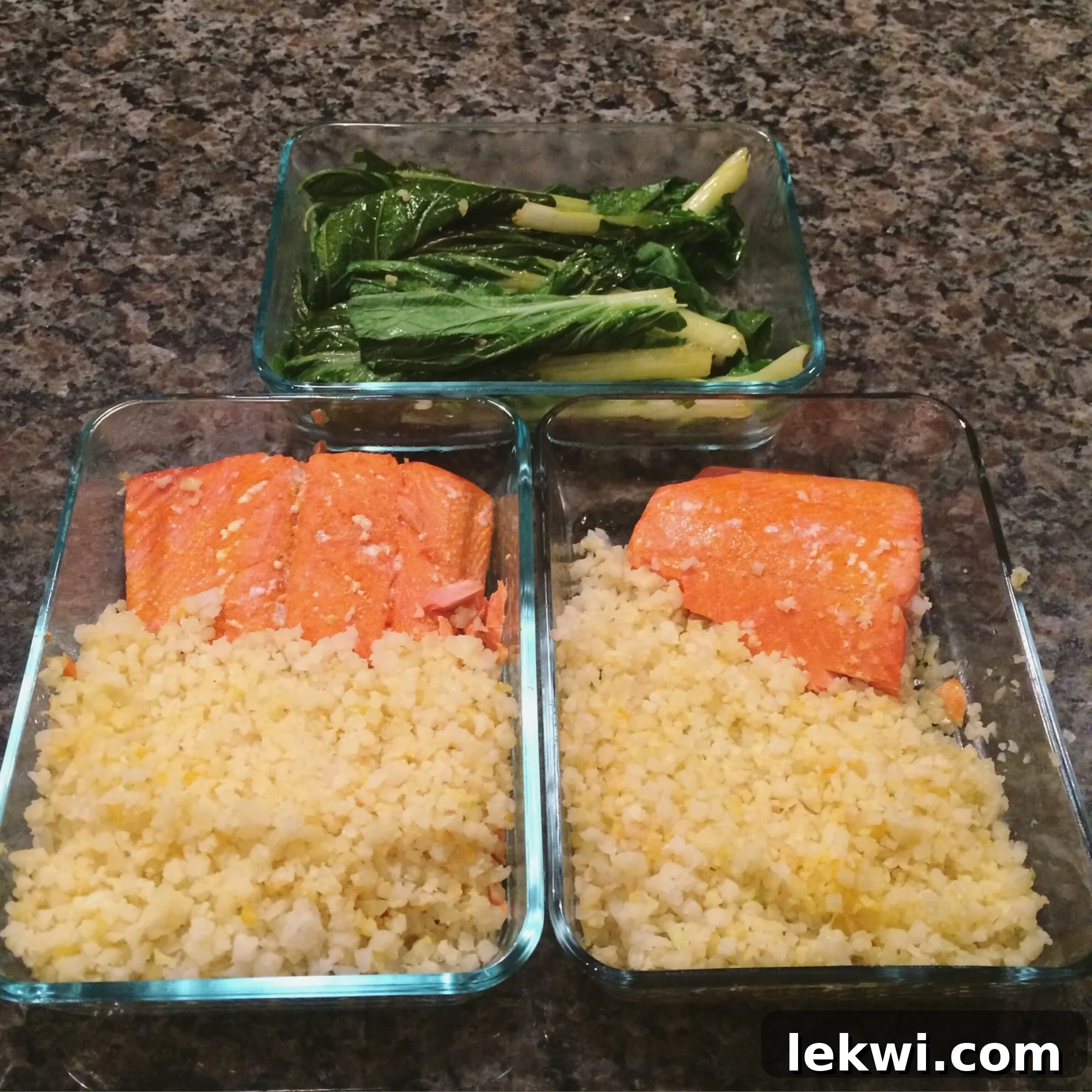 A selection of healthy, prepared meals and ingredients ready for freezing, illustrating efficient meal prep.