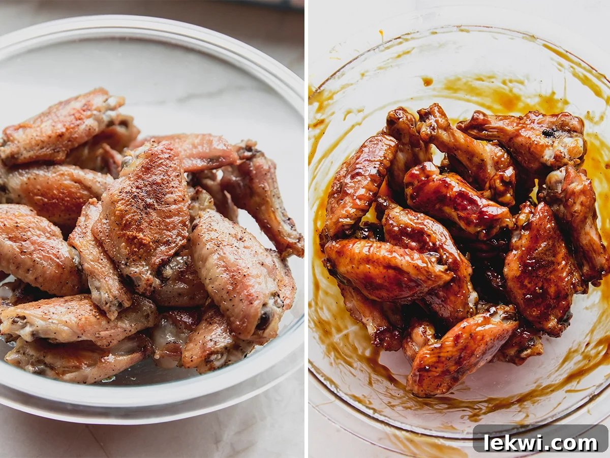 Freshly baked General Tso-style chicken wings, glistening with the rich, homemade sauce, in a large mixing bowl.