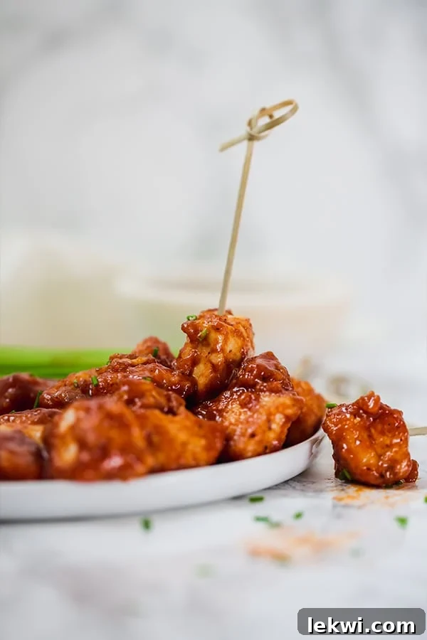 Paleo BBQ Chicken Poppers, juicy and flavorful, served as an appetizer.