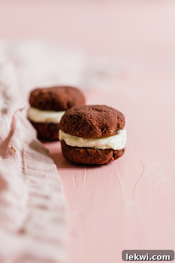 Delicious red velvet whoopie pies arranged on a serving plate.