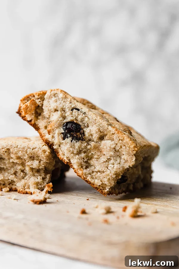 One slice of paleo Irish soda bread leaning on another slice of it.