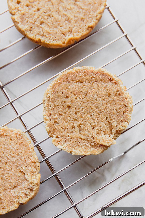 Halved shortcakes on a wire rack.