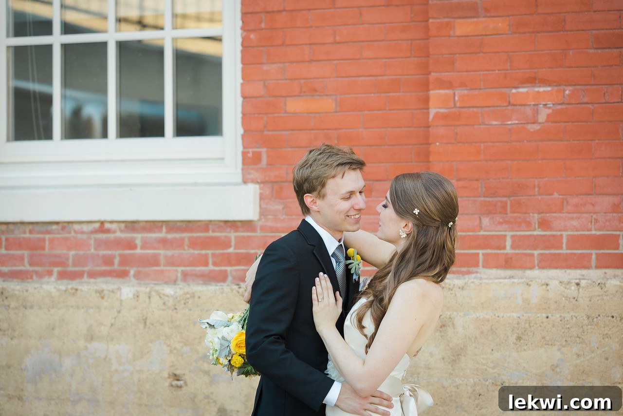 Bride and groom walking hand-in-hand at their brunch wedding.