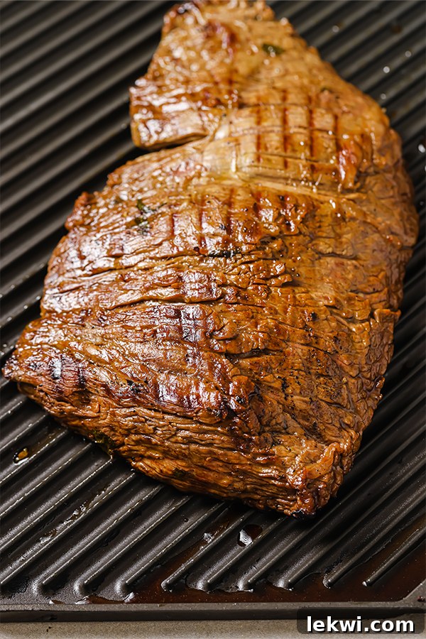 Marinated meat on a grill pan.