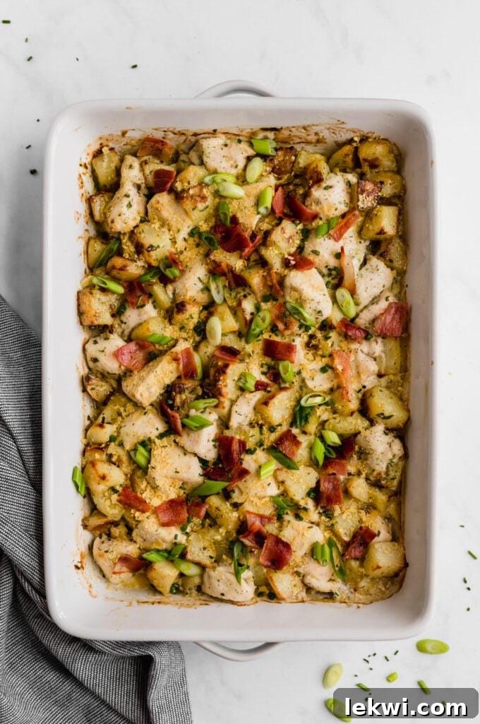 A beautifully baked chicken bacon ranch casserole, ready to be served, highlighting its rich, golden-brown top and savory ingredients.