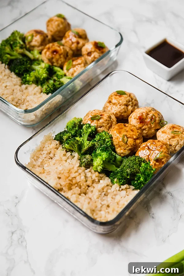 Perfectly portioned teriyaki chicken meatball meal prep bowls, ready to provide healthy and delicious lunches throughout the week.