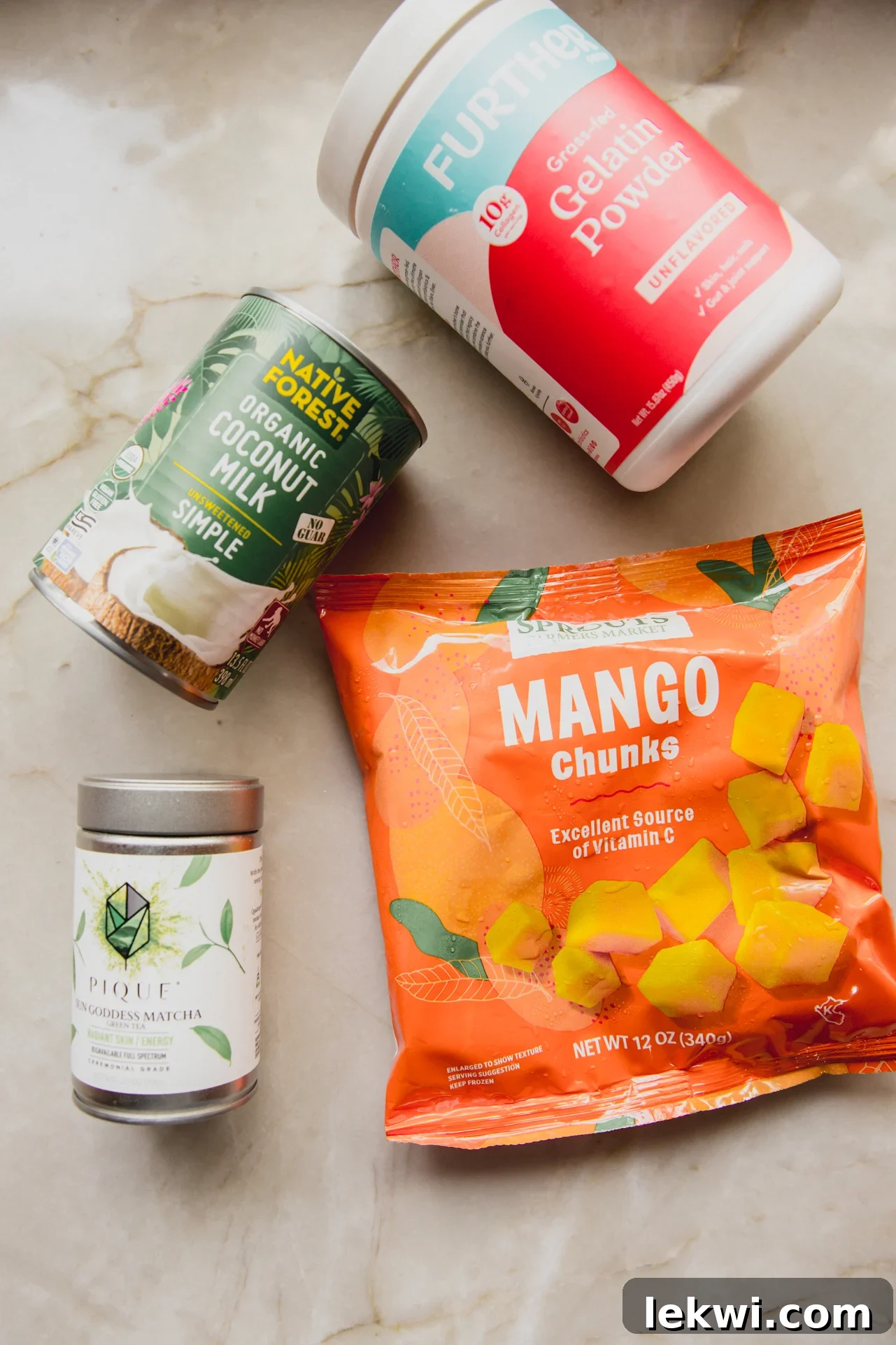 Chewy Matcha Mango Delights 4 The main ingredients needed to make the matcha mango gummies laid out on the counter.