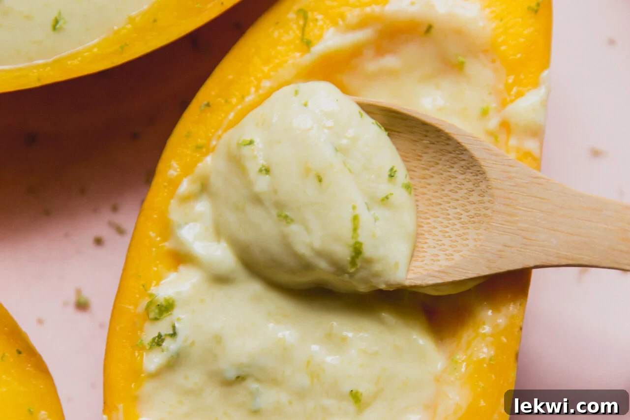 Tropical Mango Coconut Posset 6 Mango posset mixture simmering in a saucepan until thickened.