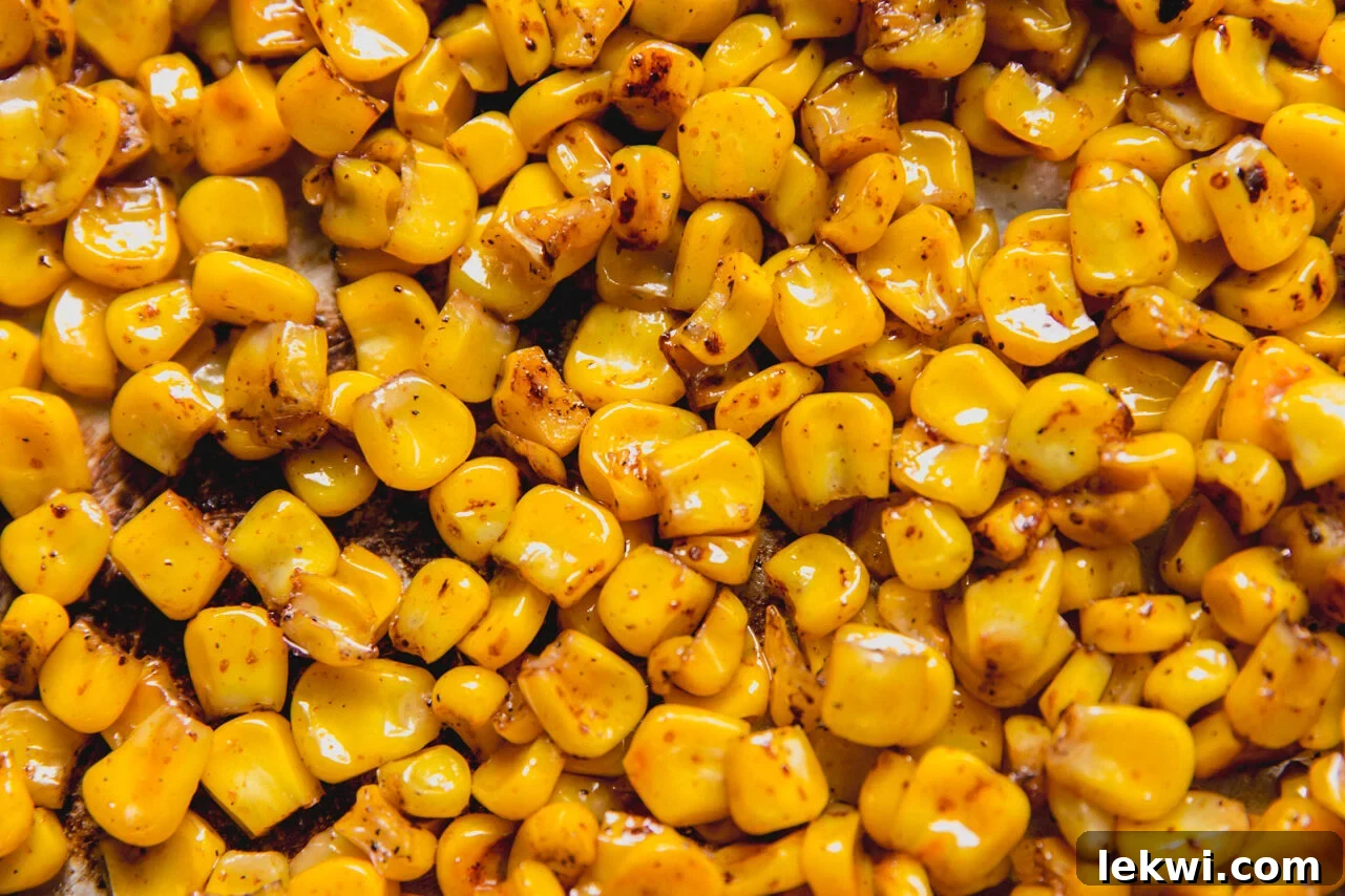 Corn sauting in a pan.